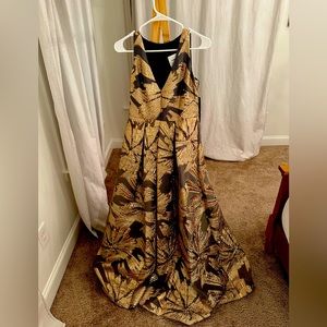 Black and gold ball gown dress.